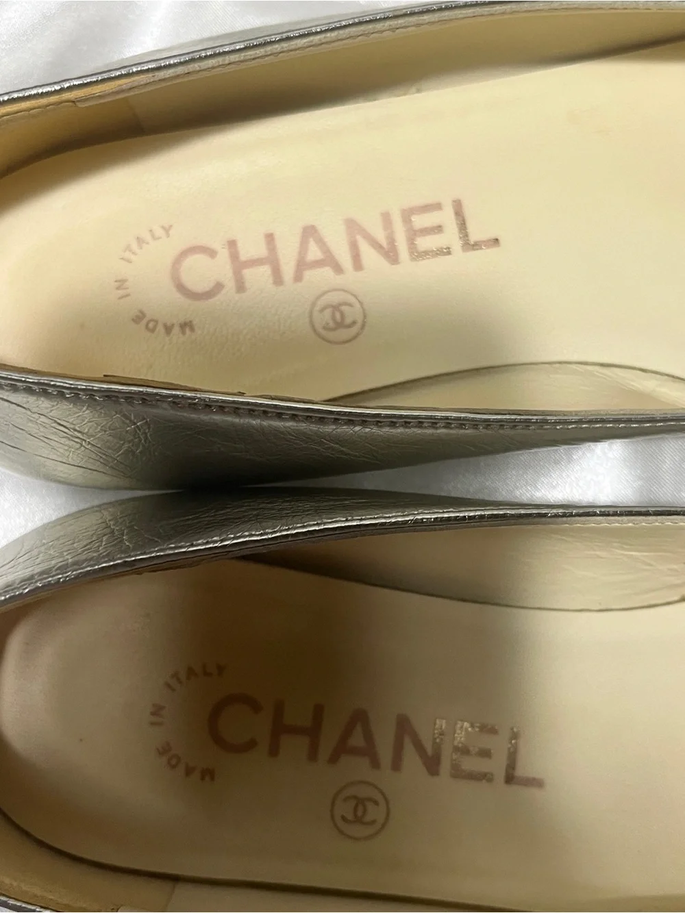 CHANEL Silver Metallic Leather Ballet Flats with Black Cap Toe